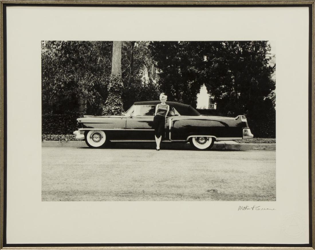 MILTON H. GREENE (D.1985) MARILYN MONROE PRINT: Framed fine art print, Marilyn Monroe Ready For An Evening Out, reproduced signature lower right of Milton H. Greene (United States, 1922-1985), paper with embossed seal of The Milton Greene Archive, 