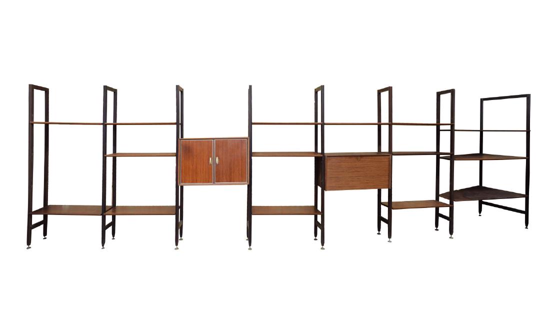 ITALIAN MID-CENTURY MODERN MODULAR BOOKCASE: Italian mid-century modern modular rosewood bookcase, c. 1950's, five units, three shelves per unit, adjustable shelf height, double door cabinet with two shelves per side, corner module to one end, s