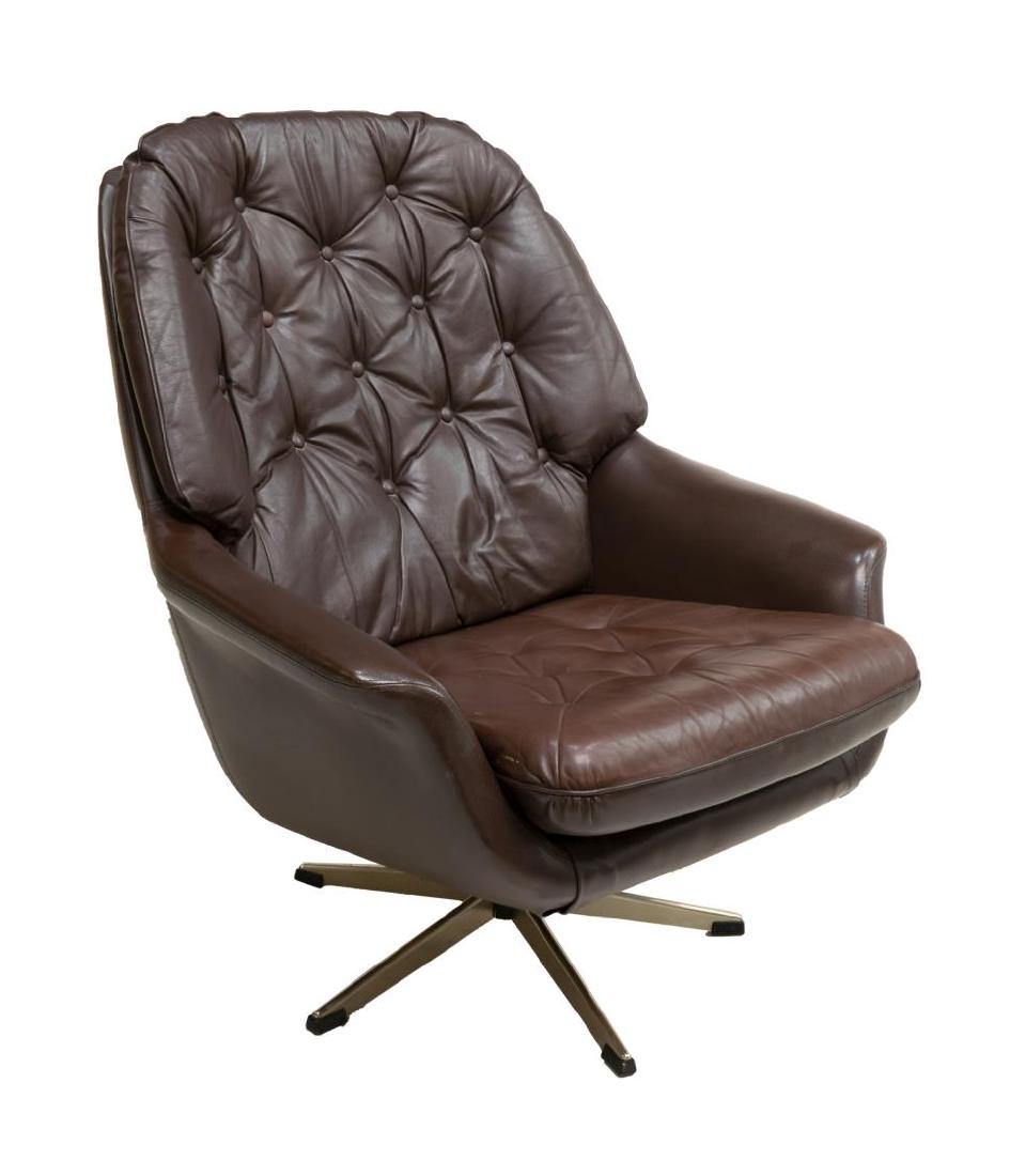 DANISH MID-CENTURY BOTTONED LEATHER ARMCHAIR: Danish mid-century brown buttoned leather arm chair, 1950's/70's, on a chromed spider base, some wear, approx 36.5"h, 30.5"w, 32"d Start Price: $100.00