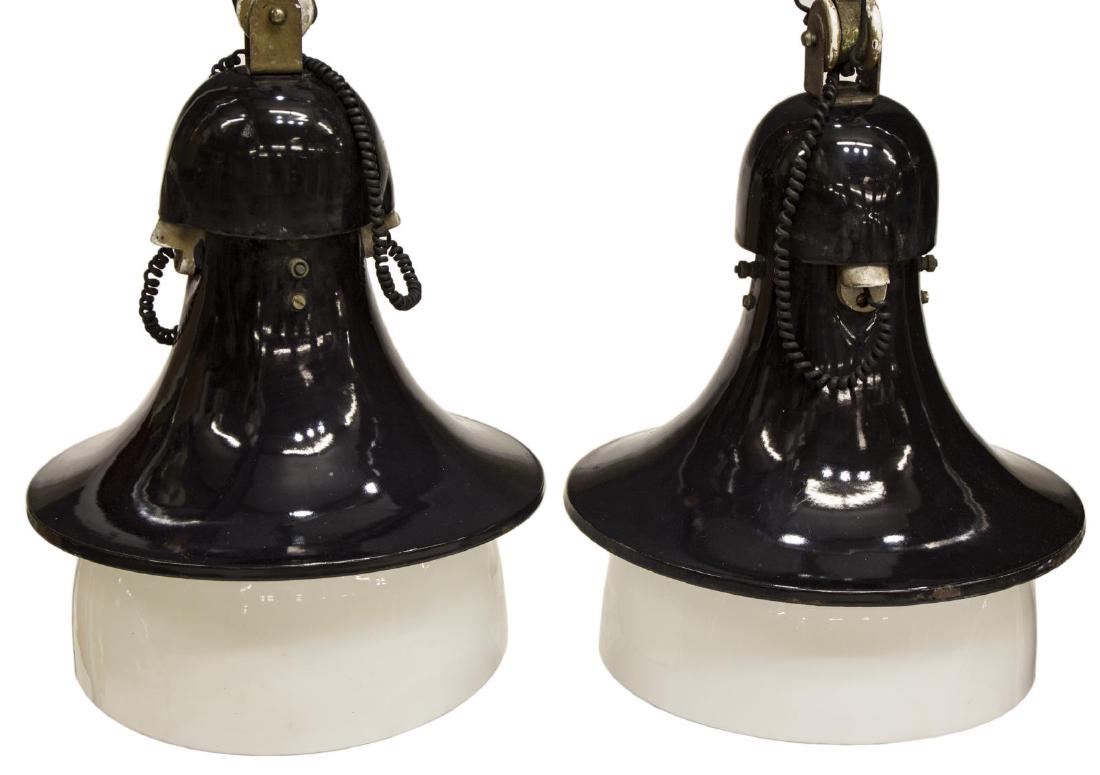 ITALIAN INDUSTRIAL ENAMELWARE CEILING LAMPS: (lot of 2) Italian Industrial enamelware two-tone ceiling lamps, c. 1960's, black enameled bell shaped shade over white enameled cylindrical shade, 16.75"h, 13.5"diam Start Price: $300.00