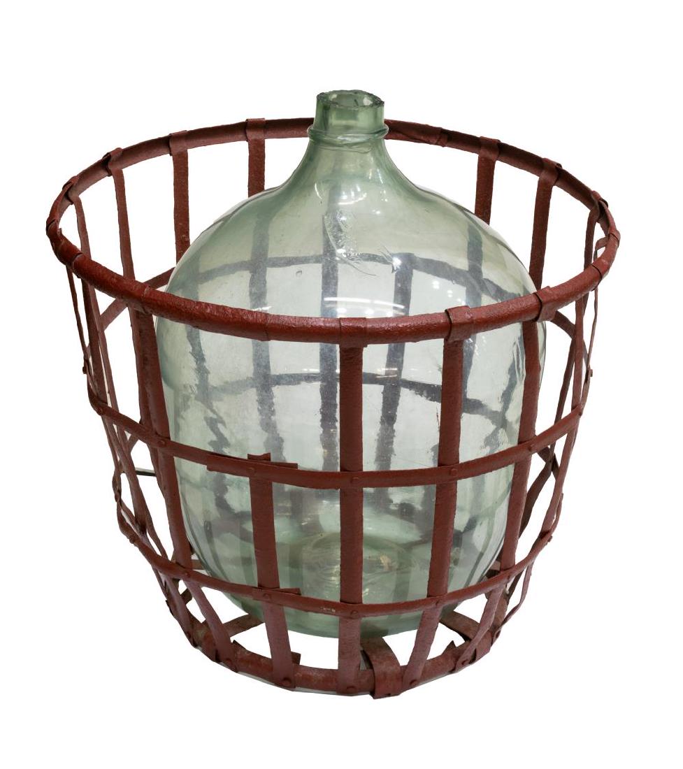 LARGE FRENCH CARBOY WINE BOTTLE IN IRON BASKET