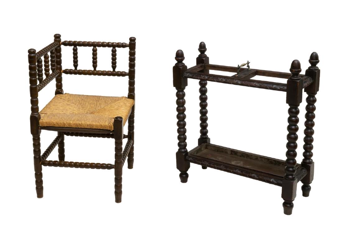 (2) ENGLISH OAK UMBRELLA STAND & CORNER CHAIR: (lot of 2) English carved oak hall items: (1) ring turned corner chair with rush seat, 27.5"h, 22"w; (1) oak umbrella stand with ornamental carving, fitted with metal plate, approx 27.5"h, 24"w, 9.5"d