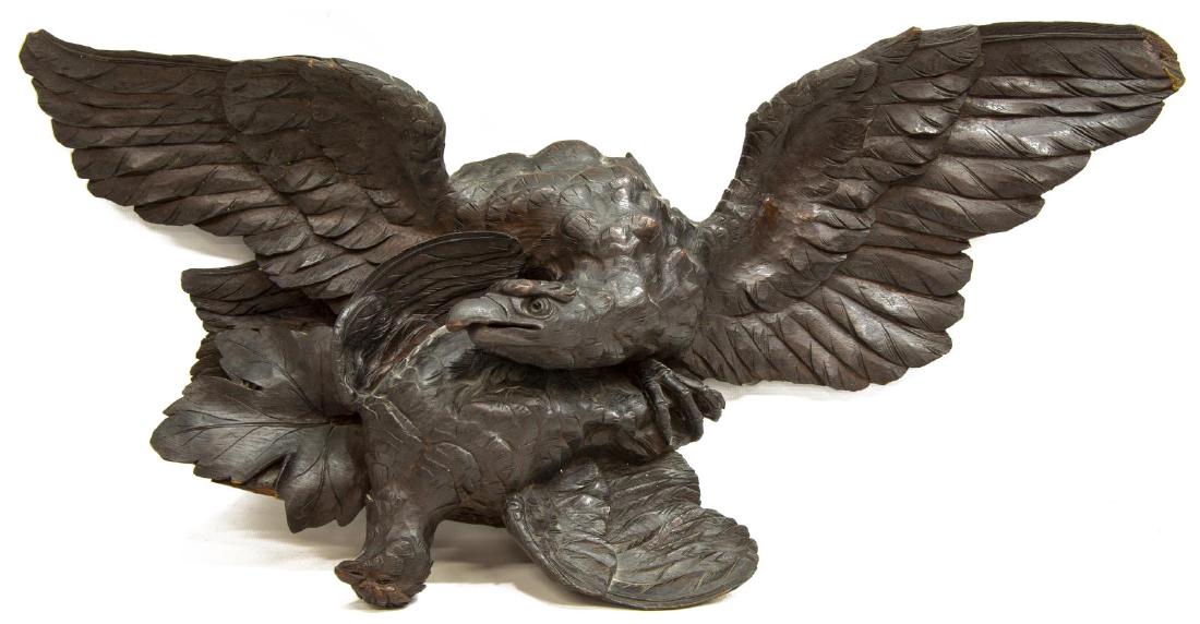 HAND CARVED HAWK CLUTCHING DOVE: Hand carved wing spread hawk, clutching a dove, likely originally mounted on a mirror or furniture cornice, some old wood loss, 13"h, 26"w, 5.5"d, 7lbs Start Price: $150.00