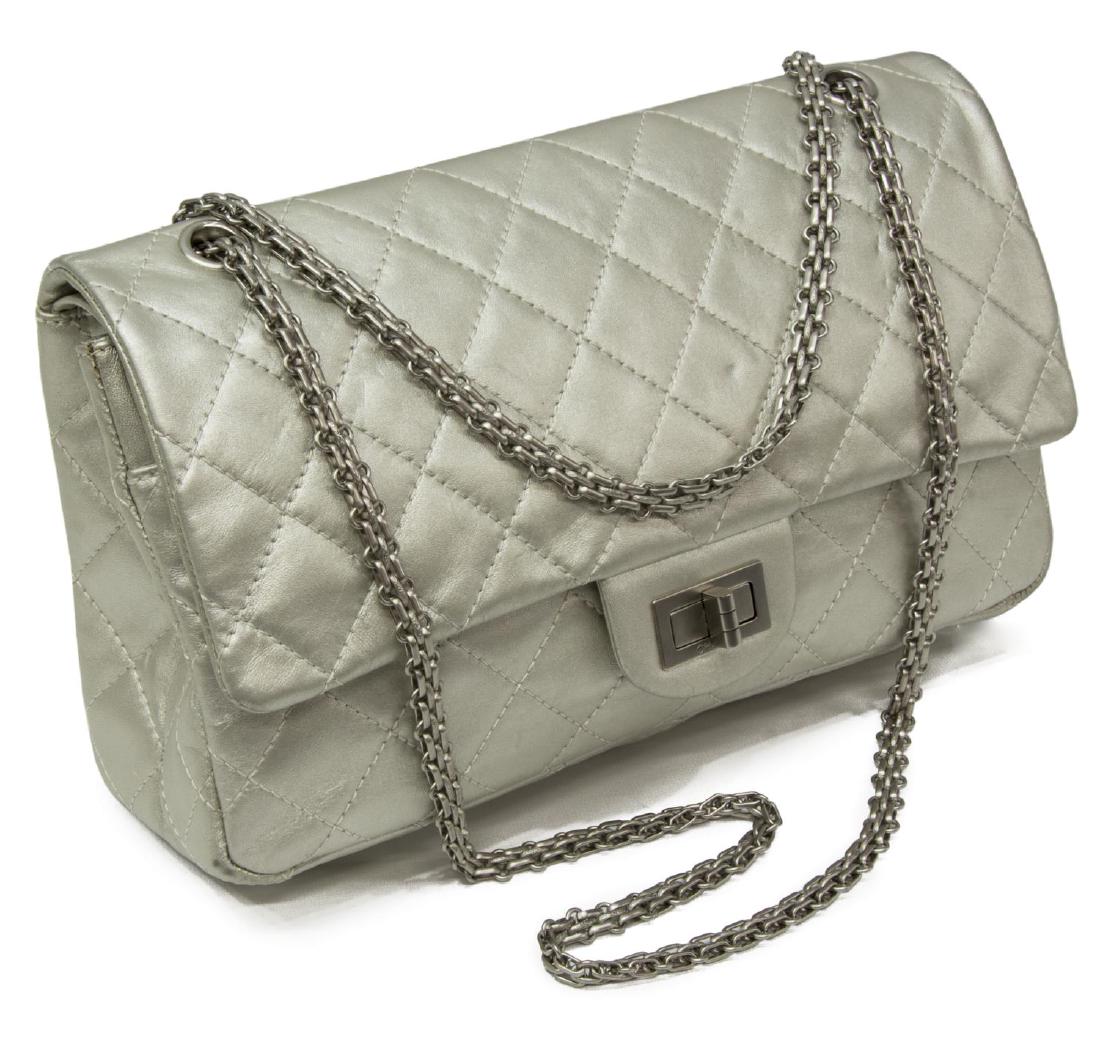 CHANEL 'REISSUE JUMBO DOUBLE FLAP' LEATHER BAG: Chanel "Reissue Jumbo Double Flap" shoulder bag, in quilted metallic silver leather, brushed silver hardware, having dual convertible chain straps, slip pocket to backside, mademoiselle turn lock to f