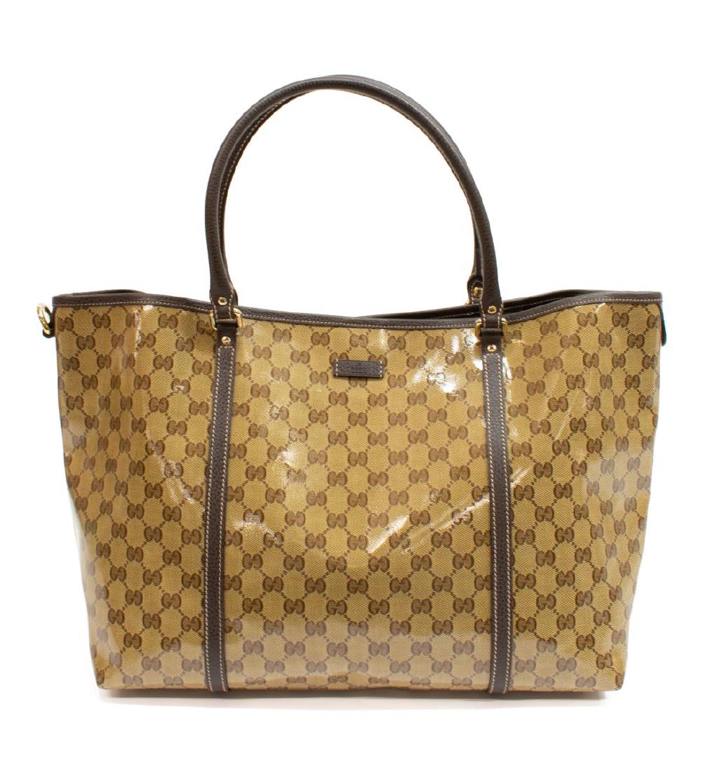 GUCCI 'JOY GM' CRYSTAL MONOGRAM COATED CANVAS TOTE: Gucci "Joy GM" tote bag, in beige crystal monogrammed coated canvas, with gold-tone hardware, leather trim, dual rolled handles, single interior slit pocket, magnetic snap closure to top, retaining du