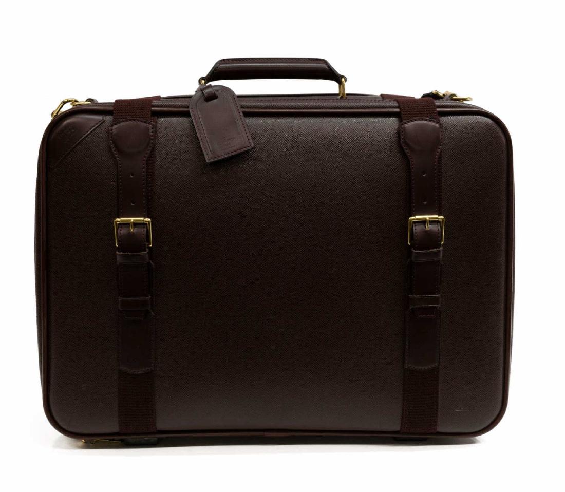 LOUIS VUITTON 'SATELLITE 53' BURGUNDY TAIGA: Louis Vuitton â€œSatellite 53" in burgundy taiga, with golden-brass hardware, flat adjustable shoulder strap and flat handle to top, single interior and exterior slit pockets, interior luggage str
