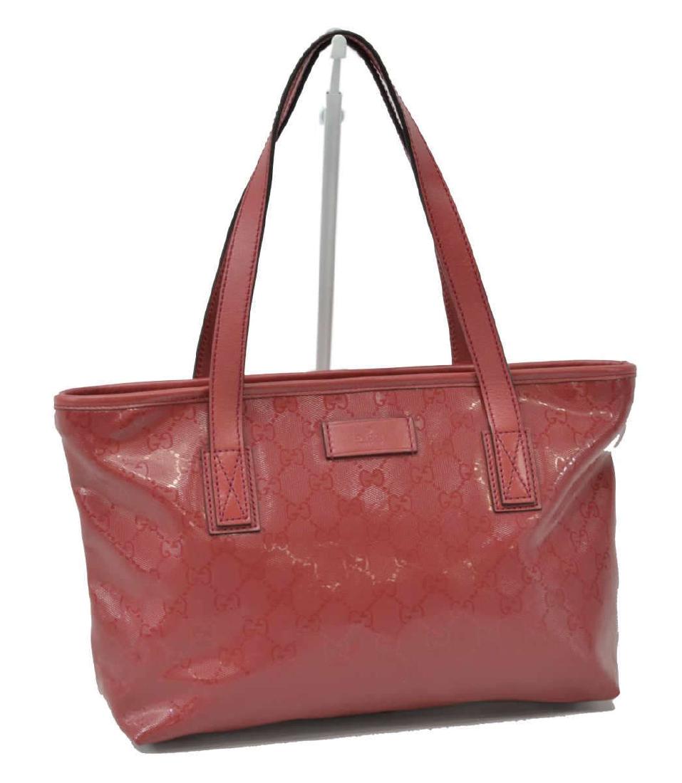 GUCCI TOTE SIZE PM DARK PINK GUCCISIMA CANVAS: Gucci tote, size PM, in dark pink Guccisima imprint canvas, with silver-tone hardware, dual flat handles, single interior zip pocket and dual slit pockets, zip closure at top, retaining dust bag, bag: