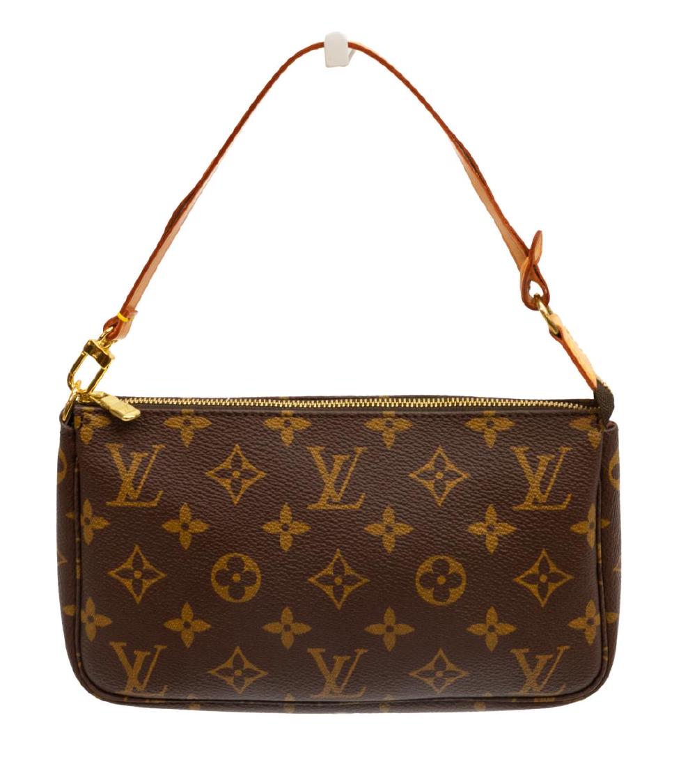 LOUIS VUITTON MONOGRAM CANVAS ACCESSORY POUCH: Louis Vuitton accessory pouch, in brown and tan monogram coated canvas, with brass hardware, tan vachetta leather trim, optional leather strap, brown canvas lining, zip closure at top, retaining dustb