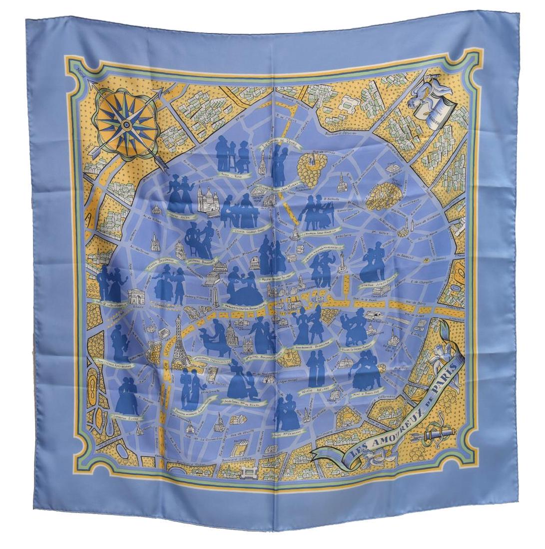 HERMES SILK TWILL SCARF, 'LES AMOUREUX DE PARIS': Hermes silk twill scarf, "Les Amoureux de Paris" pattern, original design by Maurice Tranchant, with light blue border, central print with stylized street map of Paris, retaining care tag, measurement