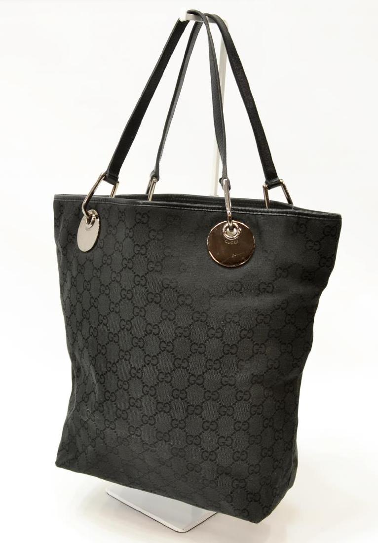 GUCCI 'ECLIPSE' BLACK GG CANVAS TOTE BAG: Gucci "Eclipse" tote bag, in black GG canvas, with gun metal-tone hardware, tonal leather trim, dual flat shoulder straps, black woven lining, dual pockets at interior wall, open at top, retains brand
