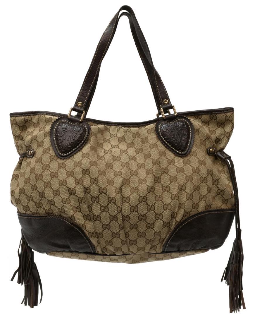 GUCCI 'TRIBECA' BROWN & TAN GG CANVAS TOTE BAG: Gucci "Tribeca" tote bag, in brown and tan GG canvas, with silver-tone hardware, brown leather trim, dual flat shoulder straps with stamped shield accents, tassel accents at sides, logo jacquard linin