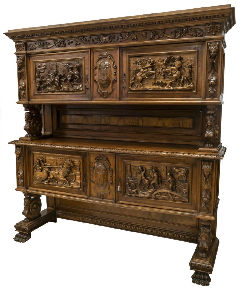ITALIAN RENAISSANCE REVIVAL WELL CARVED SIDEBOARD: Italian Renaissance Revival heavily carved walnut sideboard, early 20th c., having cornice top, carved scrolling foliate frieze panel, center medallion with carved bird, flanked by two cabinets, door 