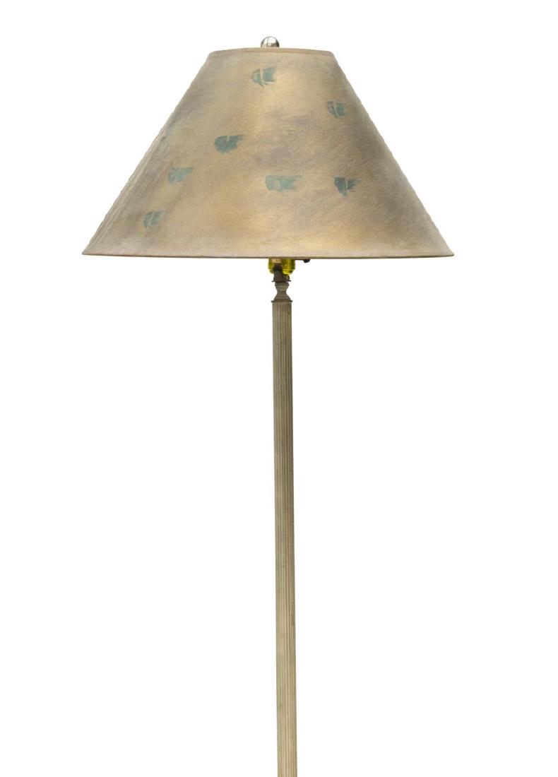 VINTAGE FLOOR LAMP WITH PAINTED SHADE: Floor lamp, late 20th c., having painted shade, concealing a single light, over fluted metal standard, on decorative stepped foot, approx 63.25"h Start Price: $40.00