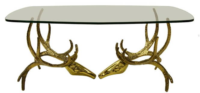 ALAIN CHERVET FRENCH MODERN BRASS DEER HEAD DININGTABLE: French modern sculptural brass and glass dining table, design by Alain Chervet (French, b. 1944), signed and dated 1984, a pair of brass deer heads with large antlers supporting a thick glass top, app