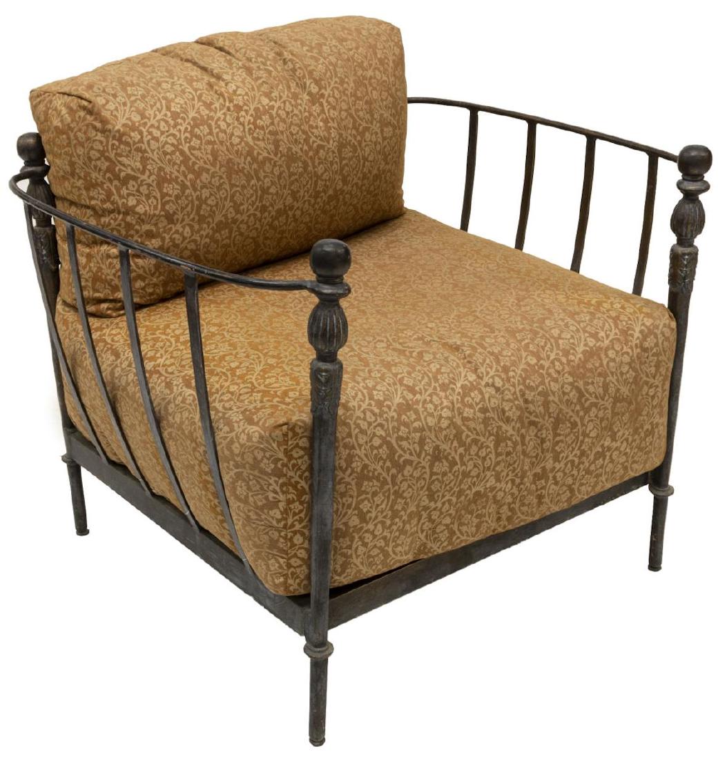 OUTDOOR PATIO STEEL FRAMED ARMCHAIR: Outdoor patio armchair, attributed to Michael Taylor Design, having steel frame with foliate design, curved sides and back, floral pattern to cushions, evidence of outdoor use, approx 30"h, 38.5"w, 36