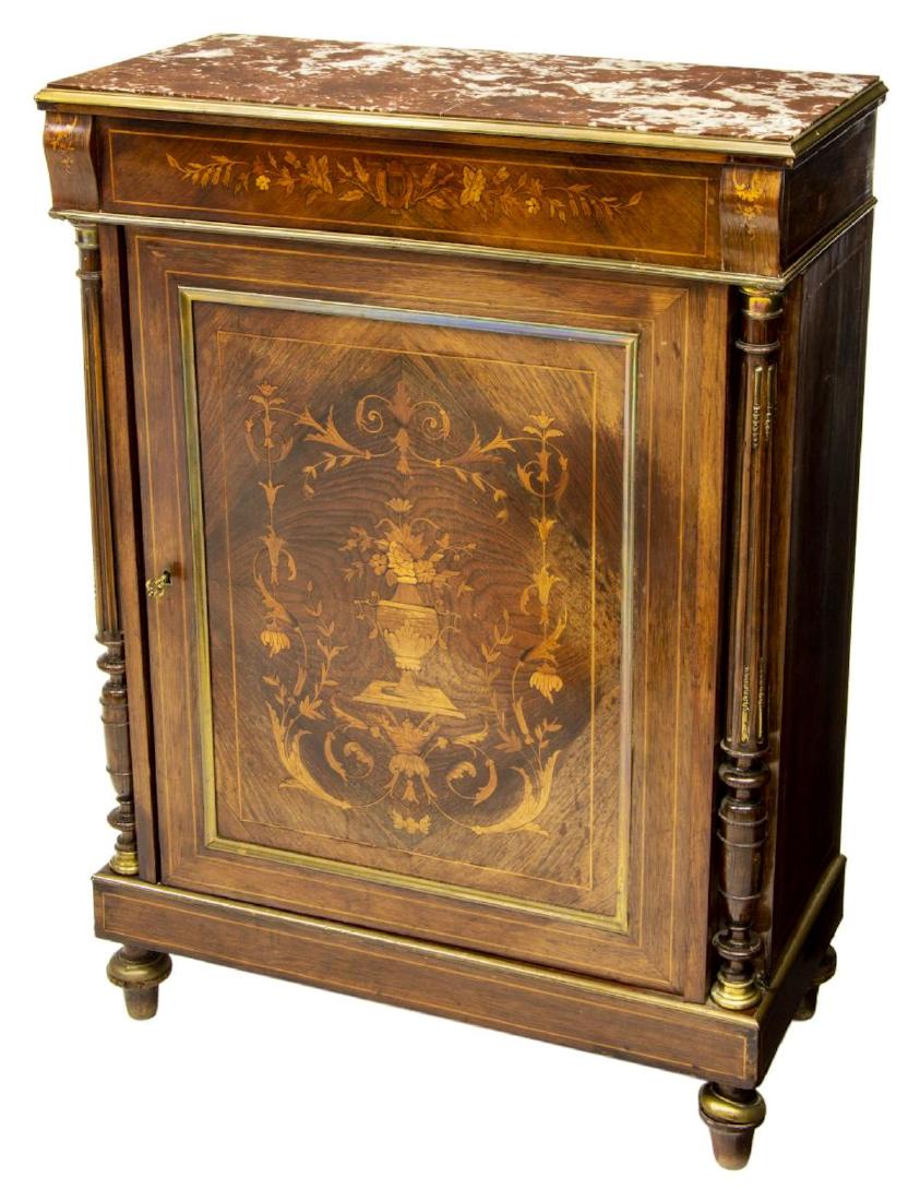 FRENCH LOUIS XVI STYLE ROSEWOOD MARBLE CABINET: French Louis XVI style rosewood cabinet, early 20th c., accented with floral marquetry, and brass, the inset marble top over a single door flanked by columns, rising on turned legs, restoration to mar
