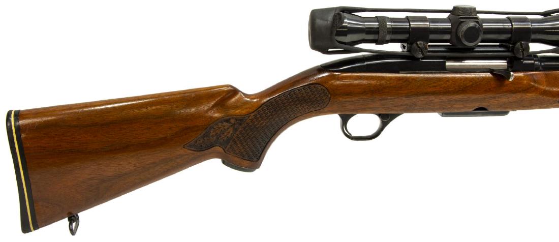 WINCHESTER MODEL 100 RIFLE, SCOPE, .243 CALIBER: Winchester Model 100 rifle, auto load, .243 Win caliber, 22" barrel, incised carved hardwood stock, two sling swivels, mounted Weaver 14-1 scope, SN 156XXX *REQUIRES FFL TRANSFER Start Price: $250.00