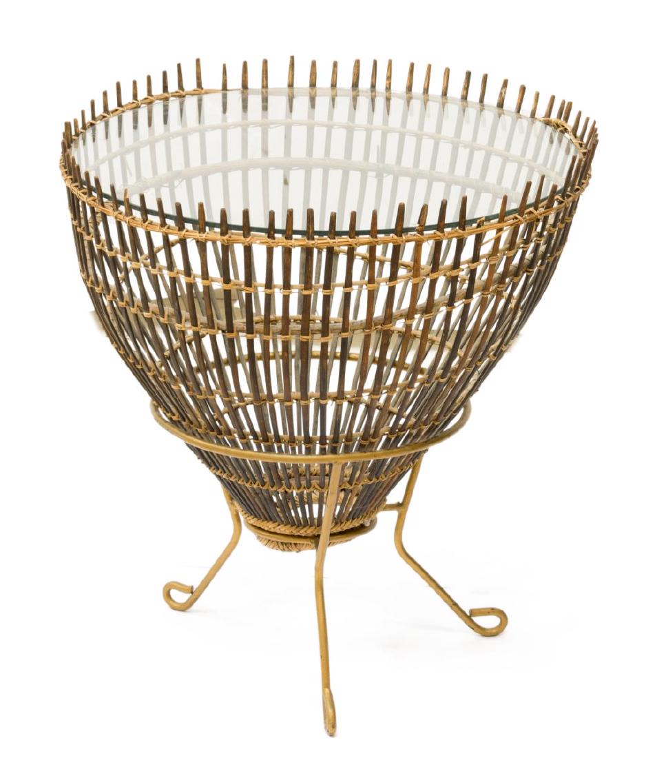 MID-CENTURY FRANCO ALBINI (ATTRIB) FISH TRAP TABLE: Mid-century modern 'Fish Trap' table, c. 1950's/60's, design attributed to Franco Albini (Italian, 1905-1977), a rattan fish basket, centering circular glass top, fitted in gilded iron base with loop