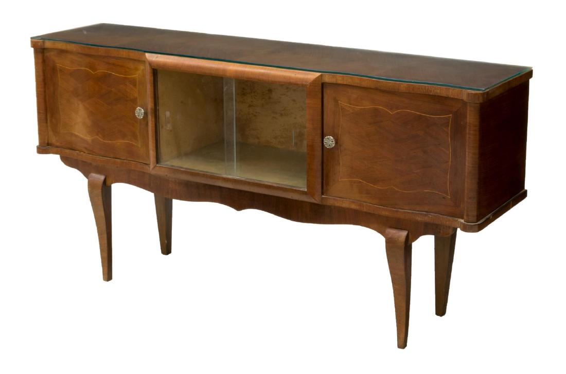 FRENCH ART DECO LOW SERVER SIDEBOARD: French Art Deco low server, c. 1930s, having glass panel resting on wood top, with three cabinets, a single cabinet at either end fitted with single shelf each and accented with geometric inlays surro