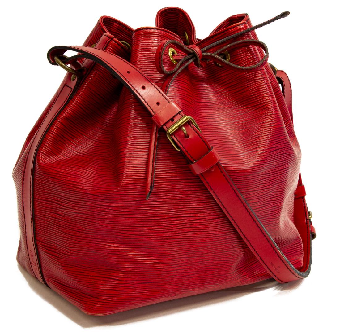 LOUIS VUITTON 'NOE' RED EPI LEATHER BUCKET BAG: Louis Vuitton â€œNoeâ€ bucket bag, in red Epi leather, with brass hardware, adjustable flat shoulder strap, drawstring closure at front face, creasing, bag: measurements for shipping purposes o