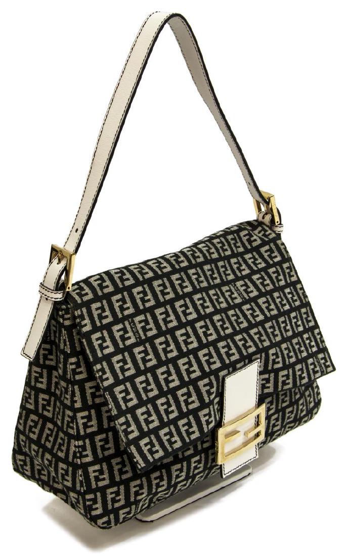 FENDI 'MAMA BAGUETTE' HANDBAG MONOGRAM CANVAS: Fendi "Mama Baguette" handbag, in monogram canvas, gold-tone hardware, single flat handle at top, single interior zip pocket, magnetic snap closure at front flap, creasing to handle, bag: measurements