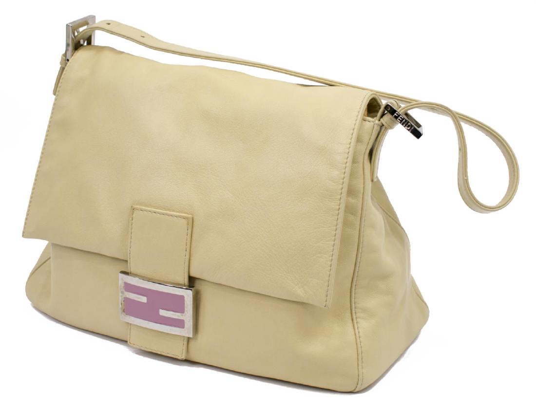 FENDI 'MAMA BAGUETTE' SMOOTH LEATHER SHOULDER BAG: Fendi "Mama Baguette" shoulder bag, in cream smooth leather, with silver tone hardware, having adjustable flat top shoulder strap, magnetic logo closure to front flap, pink satin lining, zipper pocket