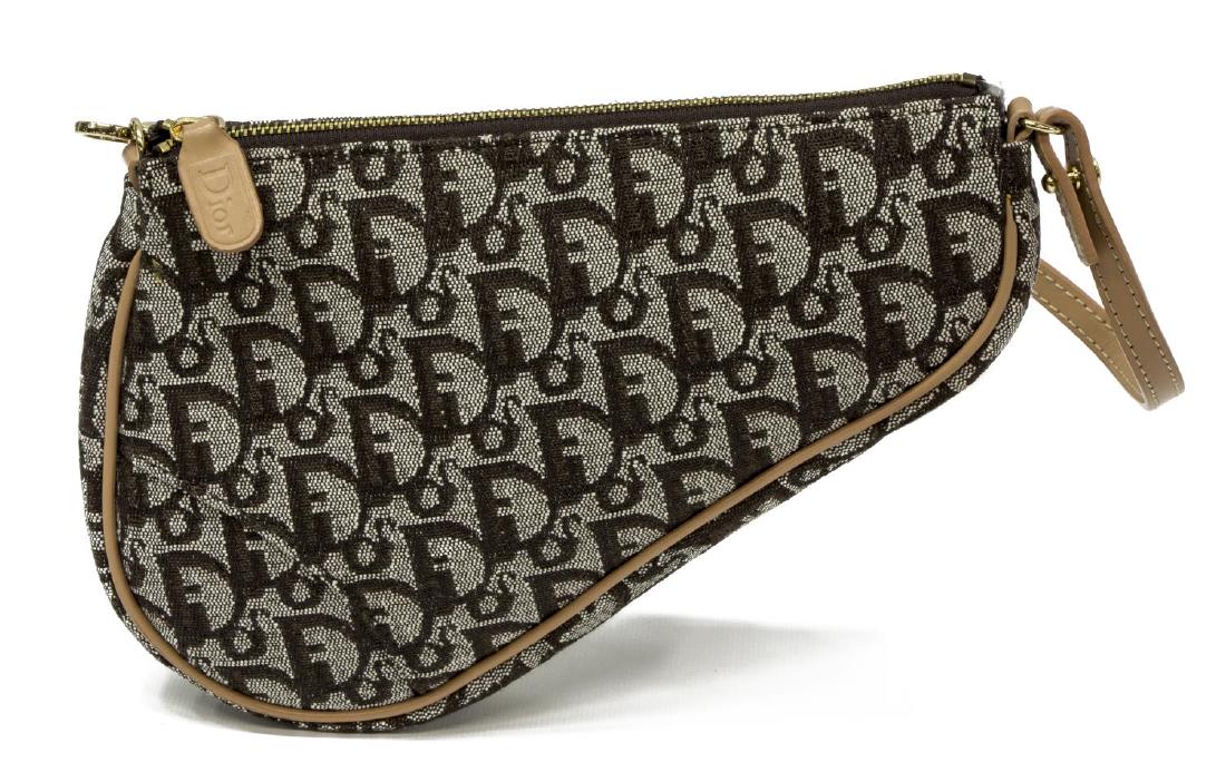 CHRISTIAN DIOR MONOGRAM CANVAS MINI SADDLE BAG: Christian Dior mini saddle bag, in brown and white Diorissimo canvas, with gold-tone hardware, tan leather trim, single flat shoulder strap, brown nylon lining, zip closure at top, bag: measurement fo