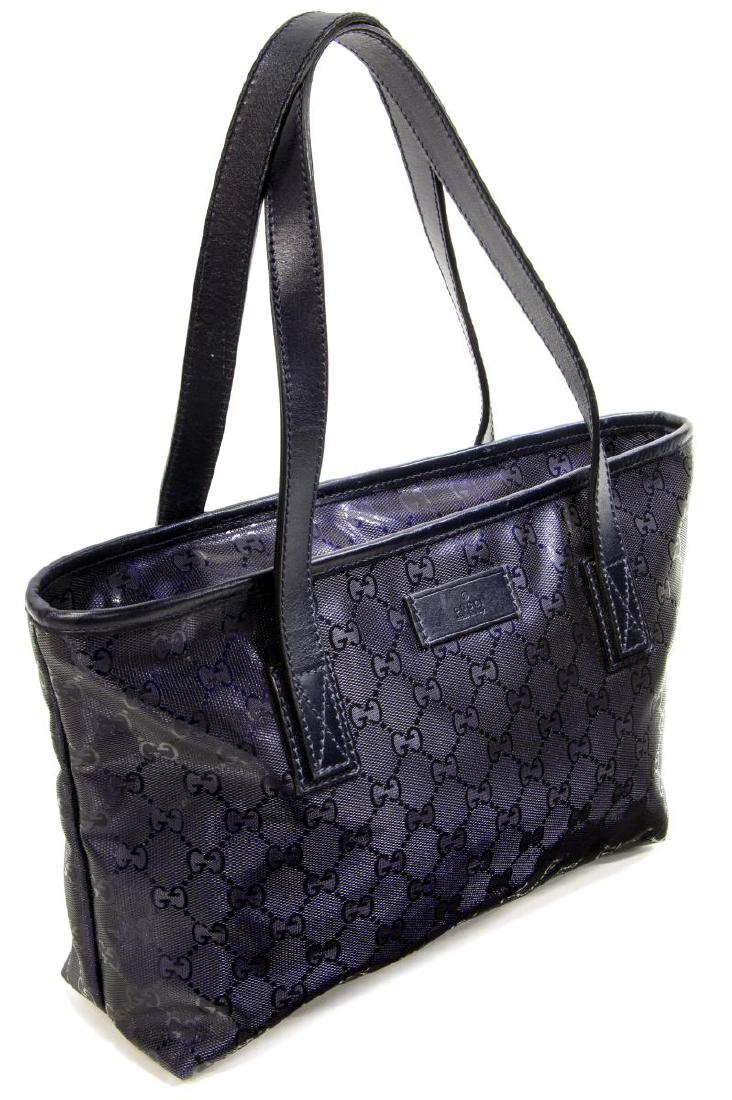 GUCCI TOTE DARK METALLIC INDIGO GUCCISSIMA CANVAS: Gucci tote bag, size PM, in dark metallic indigo Guccissima imprint coated canvas, with silver-tone hardware, dual flat handles, dual interior slit pockets, single interior zip pocket, zip closure at 