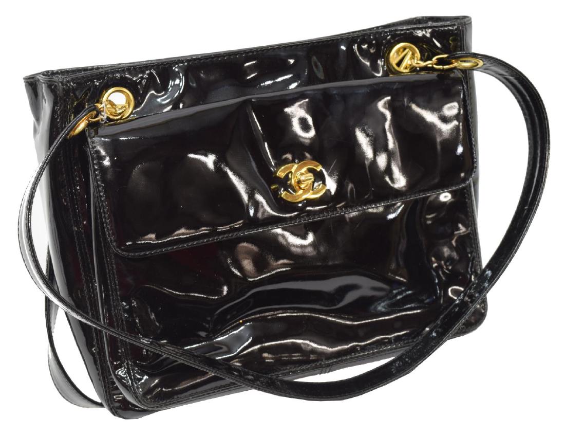 CHANEL BLACK PATENT LEATHER SHOPPING TOTE BAG: Chanel shopping tote bag, in black patent leather, with gold-tone hardware, dual flat shoulder straps featuring chain-link accents, flap pocket featuring CC turnlock to exterior front face, reverse ex