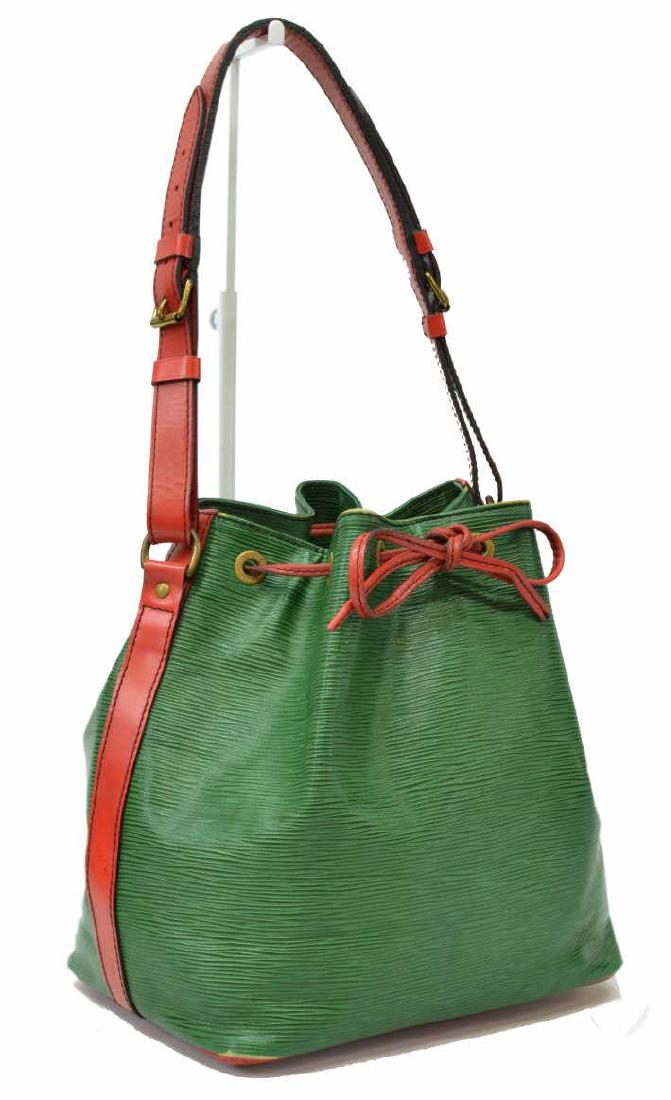 LOUIS VUITTON 'NOE PM' BUCKET BAG EPI LEATHER: Louis Vuitton â€œNoe PM" bicolor bucket bag, with black stitching, in red and green Epi leather, with brass hardware, adjustable flat shoulder strap, drawstring closure at front face, bag: measure