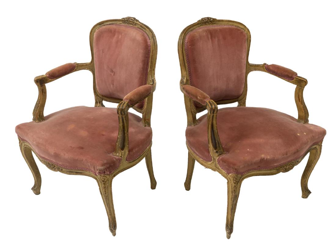 (PAIR) LOUIS XV STYLE GILTWOOD FAUTEUIL ARMCHAIRS: (pair) Louis XV style fauteuil armchairs, 20th c., having giltwood frame, back, armrests, and seat upholstered in light pink velvet, rising on cabriole legs, some spotting, approx 32"h, 21"w, 21"d Sta