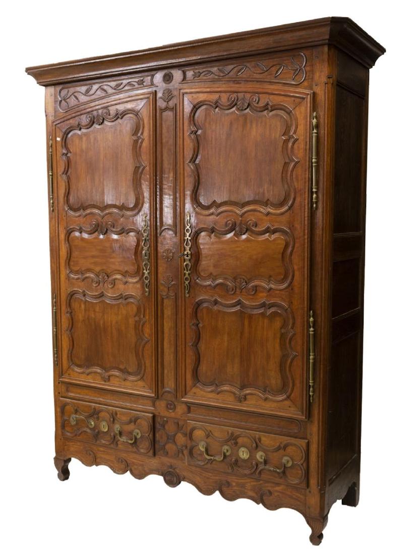 FRENCH LOUIS XV STYLE CARVED OAK ARMOIRE: French Louis XV style oak armoire, 19thc., stepped cornice, over to scroll and shell carved panel doors, lined interior with shelf, above two drawers, on short cabriole legs, approx 89"h, 62"w, 21.5"d