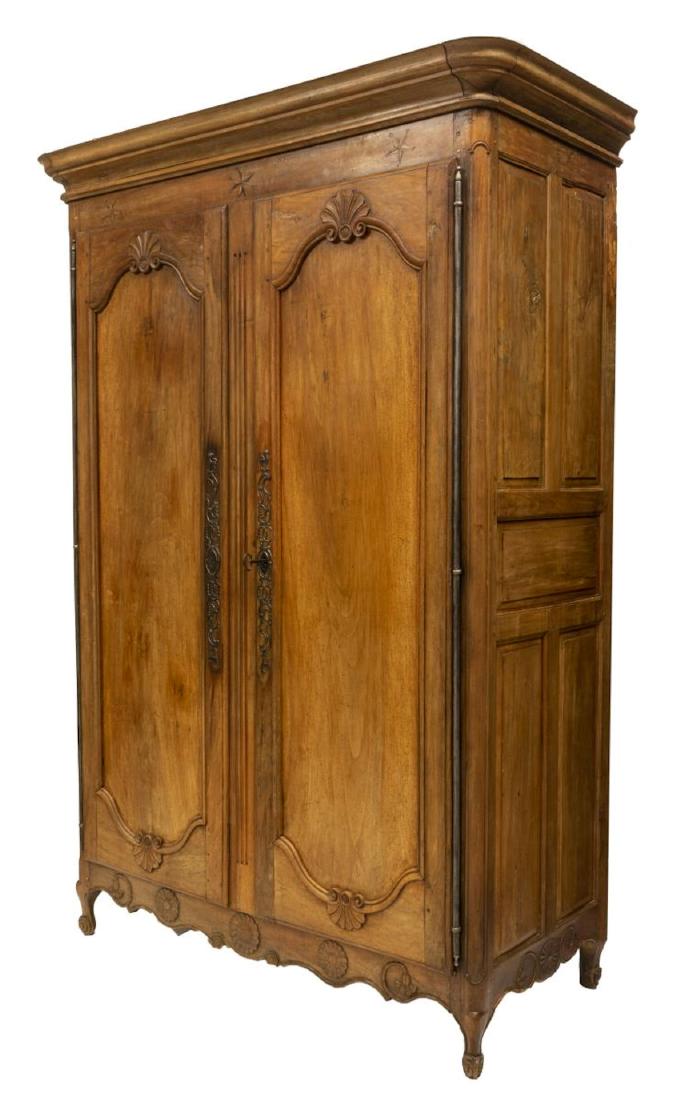 MONUMENTAL FRENCH PARQUETRY INLAID ARMOIRE: Monumental Louis XV style armoire, late 18thc., the stepped cornice above the frieze with parquetry inlaid stars, two substantial paneled doors hung from long hinges with ornate escutcheons, open to s