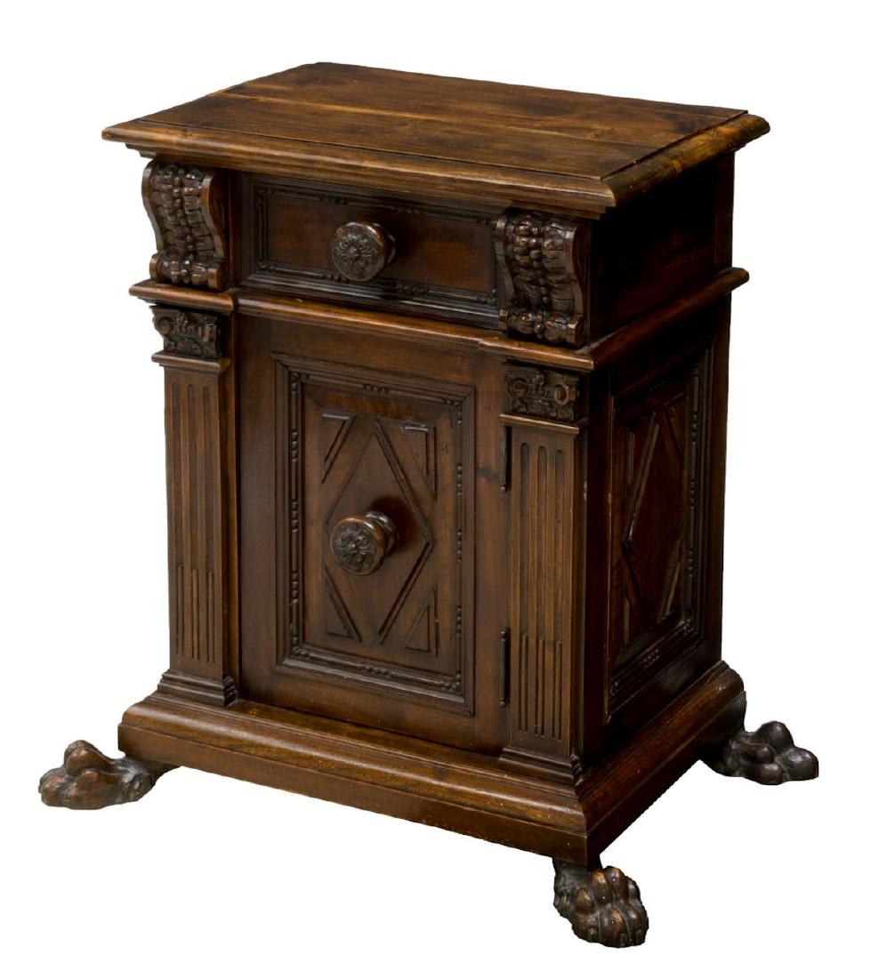 ITALIAN RENAISSANCE REVIVAL CARVED BEDSIDE CABINET: Italian Renaissance Revival bedside cabinet, early 20th c., fitted with a single drawer, over cabinet opening to shelves, flanked by fluted ionic pilasters, rising on large carved animal paw feet, app