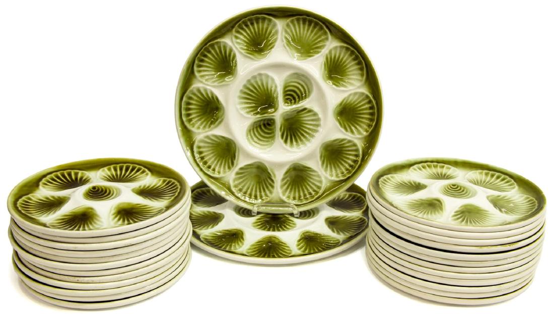 (26) FRENCH MOULIN DES LOUPS FAIENCE OYSTER PLATES: (lot of 26) French Moulin des Loups faience oyster set, including: (2) serving plates, 13"diam, (24) individual plates, 9.75"diam; 33.5lbs total Start Price: $100.00