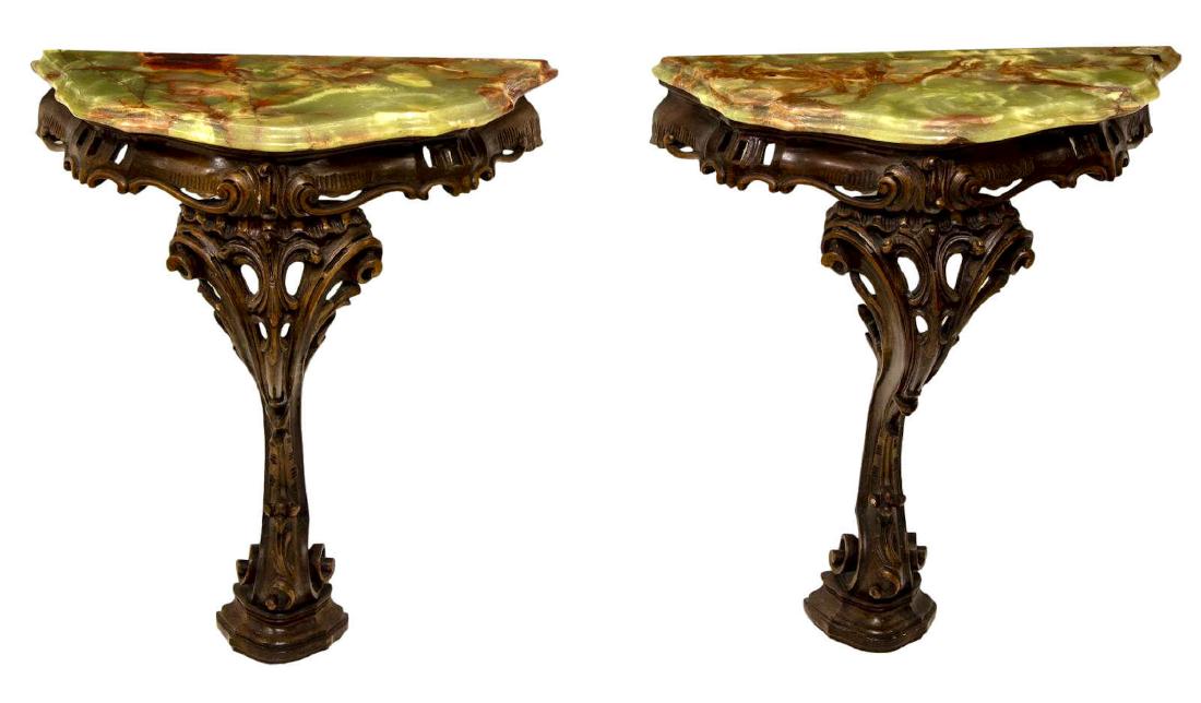 ITALIAN LOUIS XV STYLE ONYX TOP WALL BRACKETS: Italian Louis XV style wall brackets, 20thc., each onyx top, surmounting a pierce carved foliate frame with single leg, approx 25.5"h, 19.5"w, 10.75"d Start Price: $150.00