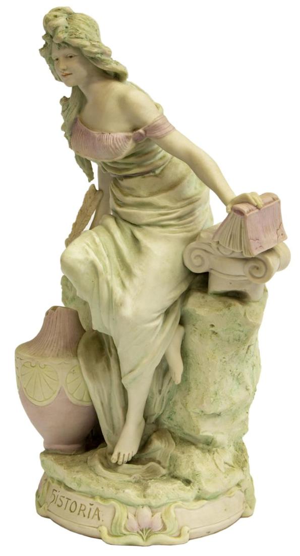 ROYAL DUX SCULPTURE, "HISTORIA", 13"H: Royal Dux sculpture, "Historia", lady seated on bench holding book and quill pen, signed at the underside with pink seal and no. 462. 13.7/8"h, 8.5"w, 6"d, 4.75lbs Start Price: $60.00