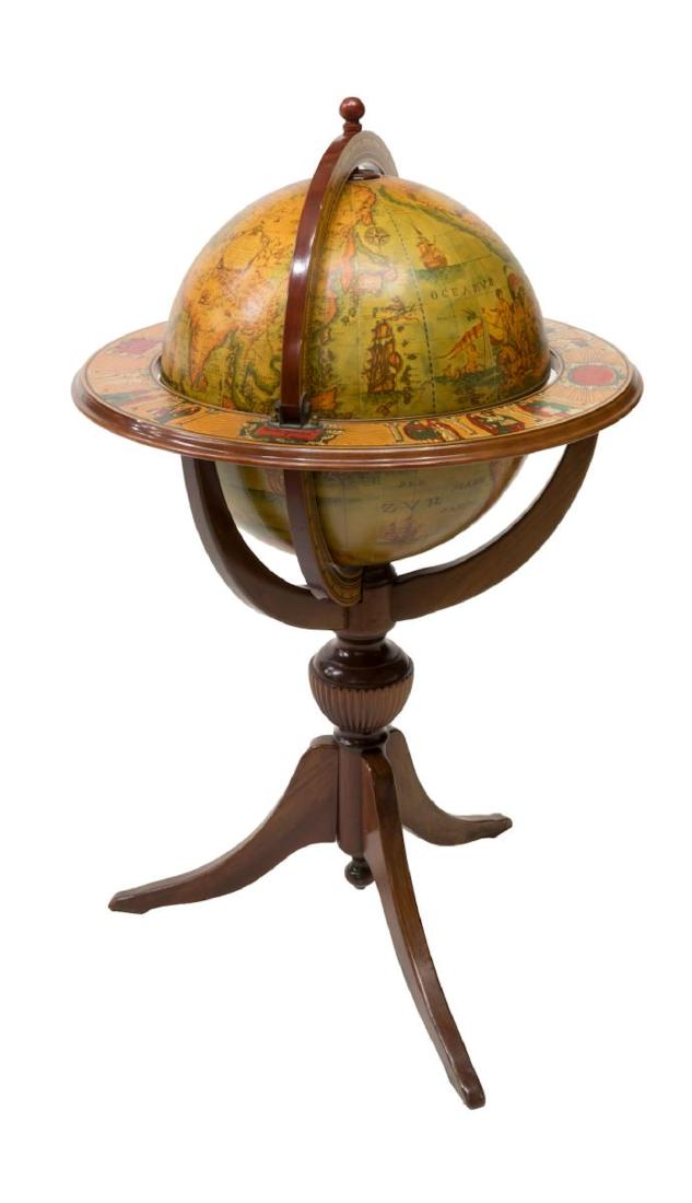 VINTAGE GLOBE FORM ROLLING BAR CART: Globe form rolling bar, hinged top opening to fitted interior with lazy Susan bottle server, interior lid showing Zodiac, reeded vasiform standard rising on four splayed legs, interior with veneer chi