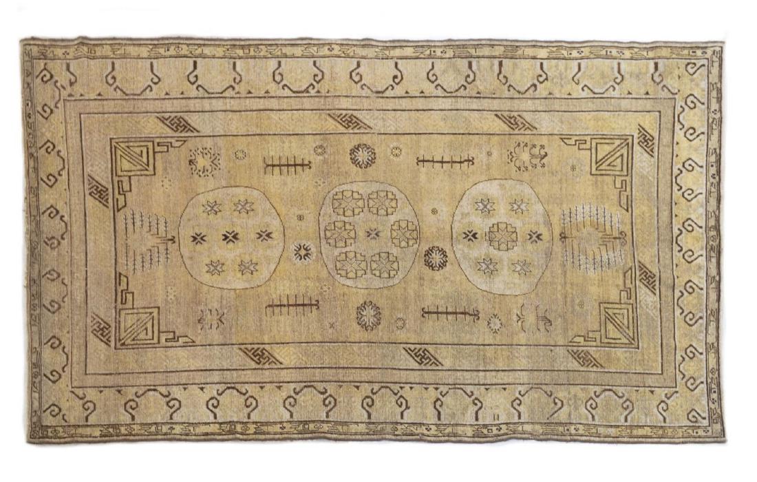 HAND-TIED KHOTAN RUG 10'7" X 5'7" (1 of 2)