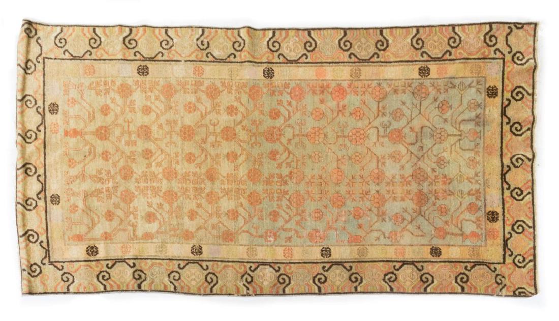 HAND-TIED KHOTAN RUG 9'4" X 4'8" (1 of 2)