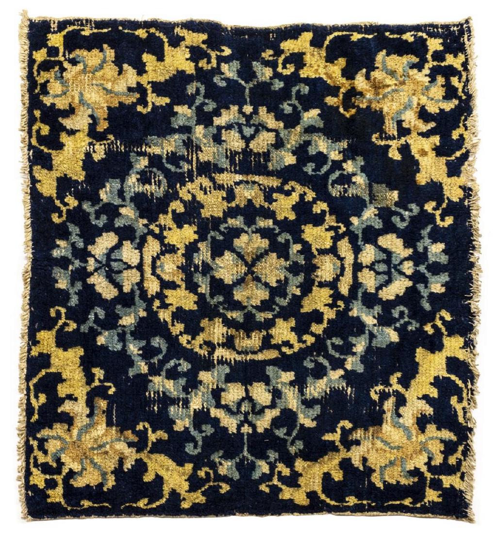 HAND-TIED CHINESE RUG 2'2" X 2'4": Hand-tied Chinese rug, wool on cotton, approx 2'2"l, 2'4"w *Provenance: The Francisco G. Zarate Collection of Oriental Rugs* Start Price: $20.00