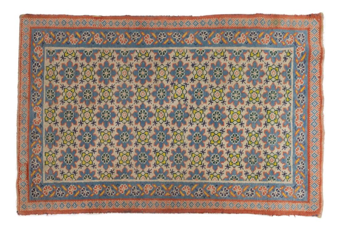 HAND-TIED KHOTAN RUG 6'1" X 3'10": Hand-tied Khotan rug, Turkistan, wool on cotton, restoration, approx 6'1"l, 3'10"w *Provenance: The Francisco G. Zarate Collection of Oriental Rugs* Start Price: $100.00