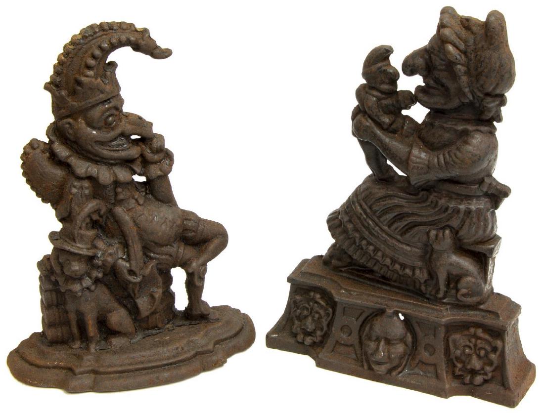 2) ENGLISH CAST IRON PUNCH & JUDY DOORSTOPS, 19THC: (pair) English cast iron door porters, 19thc., showing Punch and Judy in typical poses, largest: 14.5"h, 9.5"w, 3"d, 18lbs Start Price: $150.00