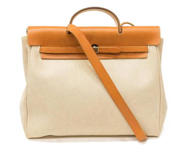 HERMES 'HERBAG' NATURAL TOILE INTERCHANGEABLE BAG: Hermes "Herbag GM" interchangeable bag, in natural toile canvas, with silver-tone hardware, tan Barenia leather trim, single flat shoulder strap, single flat top handle, pull-through closure at front,