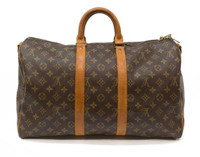 LOUIS VUITTON 'KEEPALL 45 BANDOULIERE' DUFFLE BAG: Louis Vuitton "Keepall 45 Bandouliereâ€ duffle bag, in brown and tan monogram coated canvas, with brass hardware, tan vachetta leather trim, detachable flat shoulder strap, dual rolled handles, bro