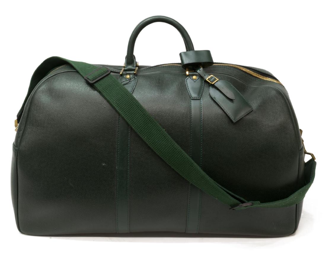 LOUIS VUITTON 'KENDALL' GREEN TAIGA TRAVEL BAG: Louis Vuitton "Kendallâ€ travel bag, in dark green Taiga leather with brass hardware, dual rolled handles, single adjustable shoulder strap, zip closure at top, handle strap, luggage tag, shoulder 