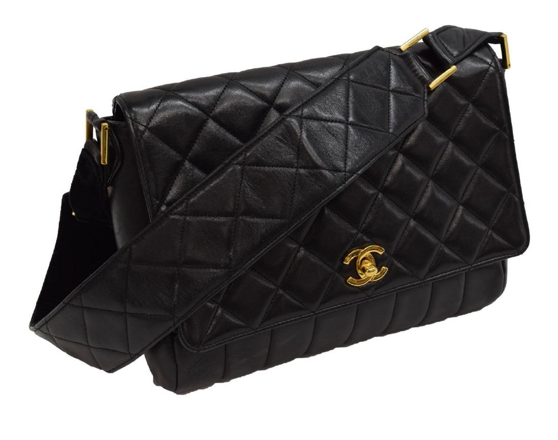 CHANEL BLACK QUILTED LEATHER & VELVET SHOULDER BAG: Chanel shoulder bag in black quilted leather, gold tone hardware, CC turnlock to front, a leather and velvet shoulder strap over flap top opening to lined interior with zippered pocket, some creasing,