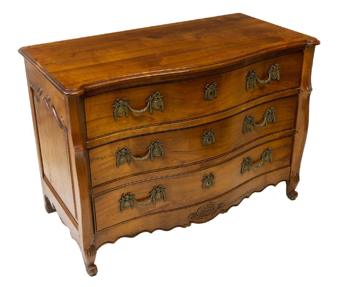 FRENCH LOUIS XV STYLE FRUITWOOD COMMODE: French Louis XV style fruitwood commode, late 20th c., the three drawers having elaborate hardware with portrait, garland and ribbon motifs, rising on cabriole legs to the front, resting on whorl feet