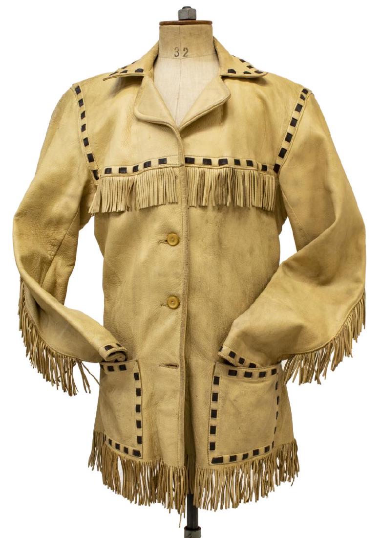 VINTAGE WESTERN LEATHER JACKET: Vintage western leather jacket by Mid-Western Sport Togs, Berlin Wisconsin, tan with brown stitched leather and fringe accents, wear and discoloration to leather, marked size 34 Start Price: $80.00