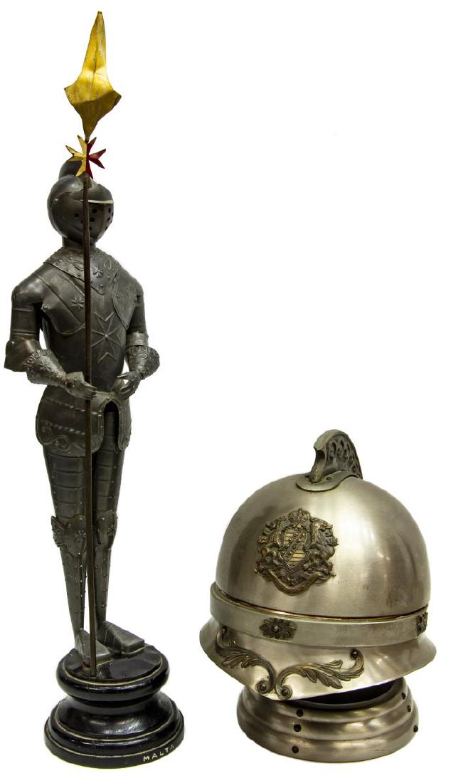 (2) HELMET-FORM DECANTER BAR SET & KNIGHT FIGURE: (lot of 2) Decorative table items, 20th c., including: (1) liqueur set, in the form of a helmet, central crest with rampant lions, hinged top opening to fitted cradle with glass decanter and four cord